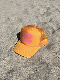 Get you hands on our highly coveted Buns Out Beach Club Trucker Hat! Perfect for beach days or coffee walks....this hat has you covered ;) 5 Panel High Crown Mesh Back Trucker Hat﻿ 100% Polyester Front 100% Polyester Mesh Back Snap Closure One size Style # LSBHAT242 Orange Adjustable Summer Hat, Adjustable Orange Summer Hat, Trendy Sunbathing Hat, Trendy One-size Sunbathing Hat, Orange Summer Outdoor Hat, Orange Beach Sun Hat, One Size Fits Most, Trendy Sunbathing Hat, One Size Fits Most, Summer Lightweight Snapback Trucker Hat, Lightweight Snapback Trucker Hat For Summer