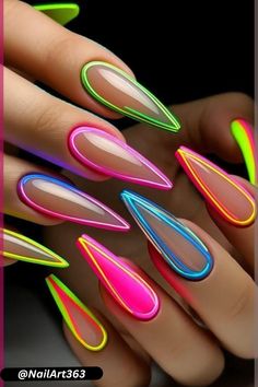 Retro-inspired neon nails with vibrant colors and bold patterns for a fun, eye-catching look.