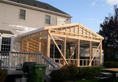 a house is being built with wood framing