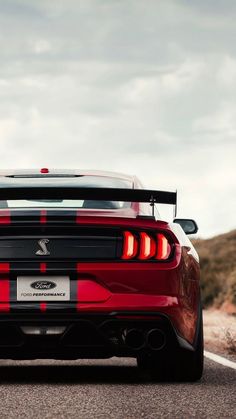 the rear end of a red sports car