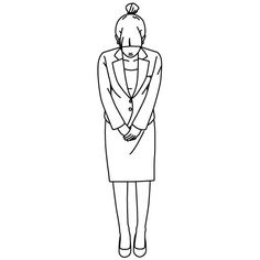 a woman in a business suit standing with her back to the camera, looking down