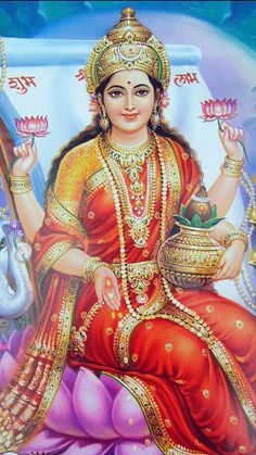 the hindu goddess sitting on a lotus