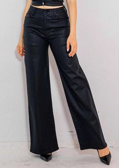 Our Coated Wide leg Jeans are the perfect addition to your wardrobe this Fall. The black wax coating adds an alluring shine, while the wide leg fit lends a luxurious silhouette. Make a bold statement with these elegant and classic jeans. 5-Pocket construction Zip-fly closure 35% Cotton, 31% Polyester, 31% Rayon, 3% Spandex Classic Jeans, Wide Leg Jeans, Leg Jeans, The Black, Wide Leg, Wax, Spandex, Boutique, Wardrobe