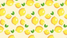 a lot of lemons with green leaves on them