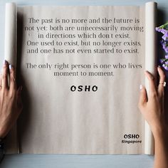 two hands on top of a piece of paper with the words osho in it