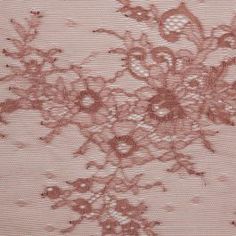 pink lace fabric with flowers on it