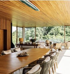 a large wooden table with chairs around it