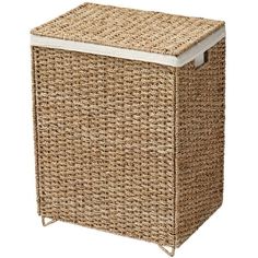 a wicker laundry hamper with white lid