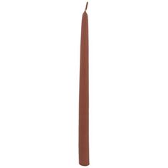 a single brown candle on a white background