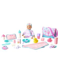 the doll is playing with her toys on the white background and it looks like she's getting ready for bedtime