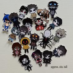 an assortment of cartoon character magnets on a white surface with the words approx 2n all