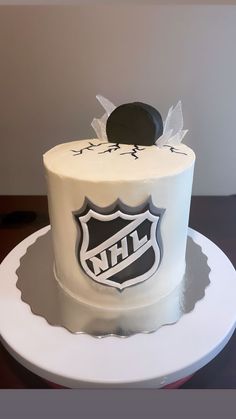 a hockey themed cake on a white plate