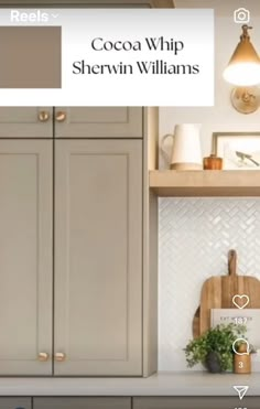 a kitchen with gray cabinets and white tile backsplash, including the words cocoa whip shervin williams