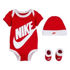 HEAD-TO-TOE COVERAGE. The Nike Box Set includes a cotton short-sleeve bodysuit with a matching hat and booties for a quick, go-to ensemble that's soft and comfortable. The bodysuit has lap shoulders and snap closures that help make changing and dressing easy. Product Details Standard fit for a relaxed, easy feel Bodysuit/Hat: 100% cotton. Booties: 62% cotton/34% polyester/4% elastane. Machine Wash Color: University Red Style: LN0073-U10 Nike Set, Baby Nike, Toddler Nikes, Nike Baby, Grey Booties, Baby Cap, Cotton Bodysuit, Nike Kids, Baby Set