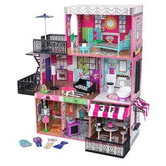 a doll house with furniture and accessories in the front, on a white background that appears to be cut out