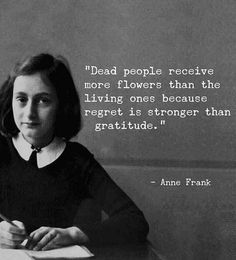 a woman sitting at a table with a pen and paper in her hand, next to a quote from anne frank