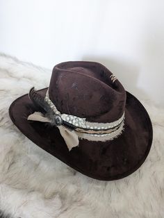 Cowgirl Custom Hand burned Vegan Suede Cowgirl Hat in chocolate brown. This hat has hand burned wild flowers on the side that cover over to the top of the hat. This hat has a layered band of chiffon ribbon layered with lace and leather.  There is some stitching on the top and side to hold a small pistol on the band.  Wild Turkey feather and silver concho! This is a Vegan Suede Cowgirl Hat in a beautiful chocolate brown. This hat is one size fits most, Medium,  with an elastic inner band to fit s Chiffon Ribbon, Hand Burn, Rancher Hat, Beautiful Chocolate, Chapeau Cowboy, Wild Turkey, Turkey Feathers, Cowgirl Hat, Country Concerts