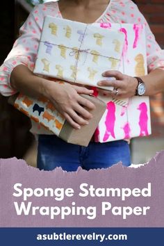 a woman holding some wrapping paper with the words sponge stamped wrapped around her chest