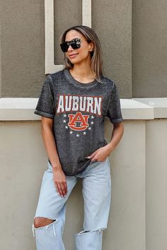 This stylish boyfriend tee is perfect for any casual occasion. It features an acid wash design for a unique vintage look. The lightweight fabric is comfortable and breathable, making it ideal for running errands or a day out. The relaxed fit allows for easy movement and the classic crew neckline adds a touch of style. Whether you're cheering on your team on gameday or just taking it easy, this tee is sure to keep you looking and feeling great. Cropped Crewneck, North Carolina Tar Heels, Lightweight Shorts, Jacksonville Jaguars, Boyfriend Tee, Ribbed Neckline, New York Jets, Acid Wash, Vintage Looks