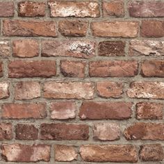 an old brick wall is shown in this image