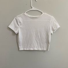 White Crop Top Tee. Bought From Target, Never Worn! White Stretch Cropped T-shirt Casual, White Cropped T-shirt For Everyday Summer Wear, Basic White Cotton Crop Top, White Basic Cotton Crop Top, White Cotton Crop Top For Everyday, Basic Plain Cotton Crop Top, Plain Cotton Crop Top For Spring, White Basic Crop Top T-shirt, White Crop Top T-shirt For Everyday