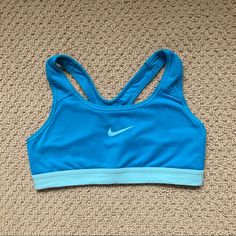 Never Worn! Accepting Offers Blue Fitted Racerback Sports Bra, Fitted Sleeveless Blue Sports Bra, Blue Racerback Top With Medium Support, Blue Sleeveless Sports Bra For Gym, Blue Sleeveless Moisture-wicking Sports Bra, Turquoise Stretch Activewear For Sports, Blue Medium Support Racerback Sports Bra, Blue Sleeveless Activewear For Sports Events, Blue Sleeveless Sporty Sports Bra