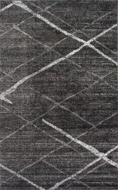 a black and white rug with an abstract design