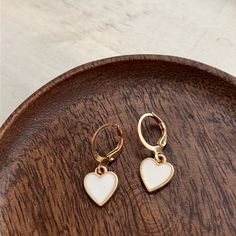 White Heart Dangle Earrings Cute White Heart Earrings, Trendy White Heart-shaped Earrings, White Heart Charm Earrings, Cute White Hoop Earrings, Everyday White Heart Earrings, White Heart-shaped Earrings With Heart Charm, White Heart Pendant Earrings For Valentine's Day, White Dangle Heart Earrings For Valentine's Day, White Hypoallergenic Heart Drop Earrings