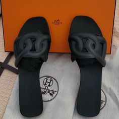 Hermes Aloha Black Rubber Sandal Size 38 Eu Fits 8us, New, Authentic. Condition Is New With Box, Dust Bags. Shipped With Usps. Hermes Rubber Aloha Sandal Size 38 Black. Know Your Hermes Size. Made In Italy. Hermes Aloha Sandal, Fluffy Hermes Sandals, Hermes H Sandals, Black Hermes Oran Sandals, Hermes Sandals Black, Hermes Sandals Fur, Hermes Sandals, Rubber Slippers, Sneaker Closet