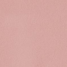 a close up view of a pink background