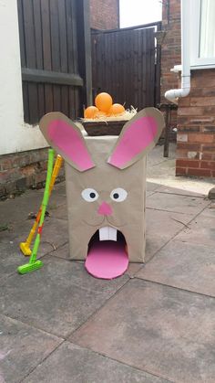 a paper bag with a bunny face on it