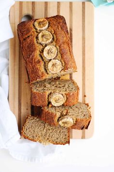 sliced banana bread sitting on top of a cutting board