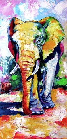 an elephant is painted in bright colors