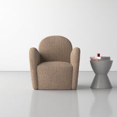 Get cozy and relax in style with this armchair. Featuring a solid wood frame and upholstered in durable polyester fabric, this chair offers firm foam cushioning and a tight back for support. With its round arms and enclosed base, it adds a modern touch to any space. Water-resistant and easy to clean, it's perfect for residential use. AllModern Armchair - AllModern Evin Armchair in Glore | Size 33.1" H X 31.9" W X 32.7" D Person Sitting, Foam Cushions, 6 D, Getting Cozy, Relaxed Style, All Modern, Wood Frame, Polyester Fabric, Solid Wood