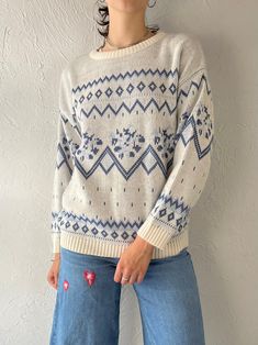 "- Vintage white and blue crew neck sweater - Feels like a wool blend - No tags - Medium Chest: 20\" Length: 24\" Sleeve: 18'" Blue Jacquard Knit Crew Neck Sweater, Winter White Crew Neck Sweater For Winter, Nordic Crew Neck Sweater For Fall, Nordic Blue Crew Neck Sweater, Blue Nordic Crew Neck Sweater, Blue Fair Isle Sweater For Cold Weather, Cozy Blue Sweater With Fair Isle Pattern, Blue Nordic Knit Sweater, White Fair Isle Sweater For Cold Weather