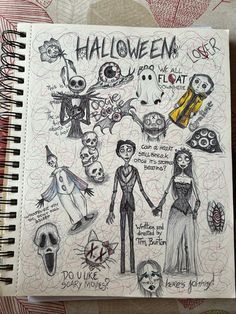 a notebook with some drawings on it and writing in the pages that says halloween is flat