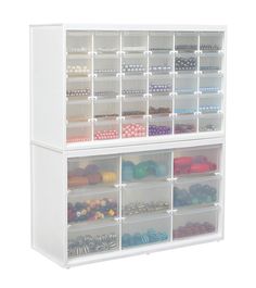 a white shelf filled with lots of different types of beads