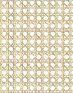 a close up view of a woven fabric with circles and lines on the side, in beige