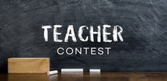 a chalkboard with the words teacher contest written on it next to a wooden block