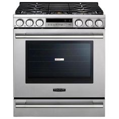 a stainless steel stove with four burners and two oven doors on each side,