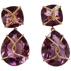 18kt Yellow Gold Drop Earring with gold wrapped faceted cushion shaped Purple Amethyst top and faceted pear-shaped Purple Amethyst.  This elegant earring measures an inch and a half long.  The top cushion is shaped Amethyst that measures half an inch wide. The faceted pear-shaped Amethyst drop measures an inch and an eighth wide.  Can be pierced or clip.  Additionally, these earrings can be made with any stone combination and color gold. Please let me know if you have any questions. Best, Christ Cushion Cut Earrings, Yellow Gold Drop Earrings, Gold Wrap, Cushion Cut Ring, Yellow Gold Earrings, Pink Topaz, Fine Jewelry Collection, Drop Earring, Gold Drop Earrings