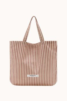 The Stripe Market Tote Bag is a practical accessory crafted from durable cotton canvas in NYC. Available in red and cream stripe or classic black and cream stripe, its compact size makes it perfect for everyday essentials, while sturdy handles ensure comfortable carrying. Farmers Market Tote Bag, Orseund Iris, Business Product Ideas, Market Tote Bag, Oversized Tote, Market Tote, Eco Bag, Fall Winter 2024, Black And Cream