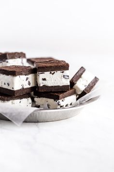 chocolate and white ice cream sandwiches on a plate