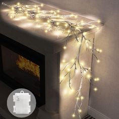 a fire place with some lights on it