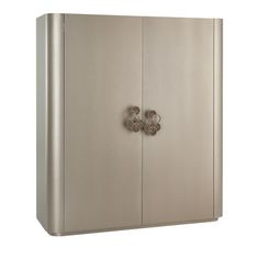 a metal cabinet with two doors and some knobs on it