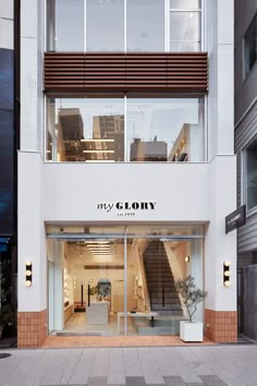 the entrance to my glory store in an urban setting