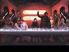 a group of people sitting at a table in front of a star wars scene