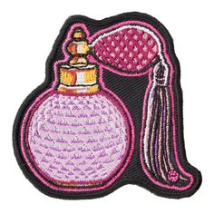 a pink and black embroidered patch with a bottle on the side, which has a tassell hanging from it