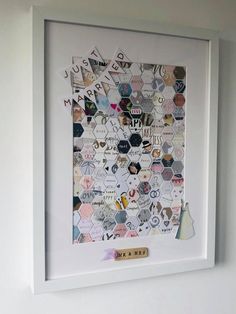 a white frame with many different types of magnets on it