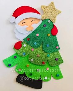 a christmas tree made out of foam and glitter with a santa clause on it's head